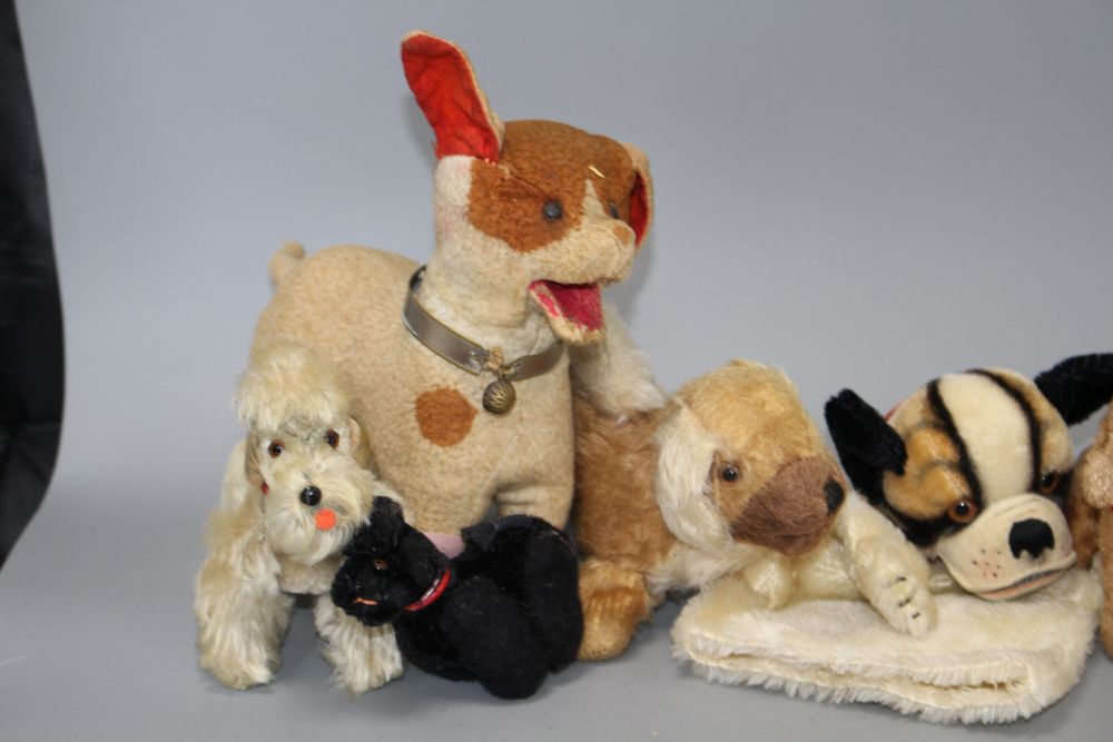 Eight assorted vintage soft toy dogs including Steiff
